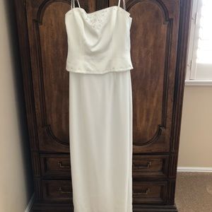 Wedding dress or mother of the bride dress.